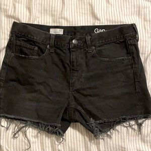 Black cutoff denim shorts